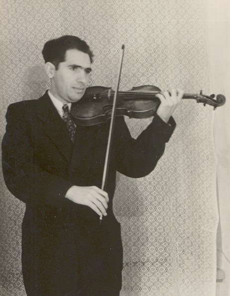 Gheorghe Neaga seated at piano